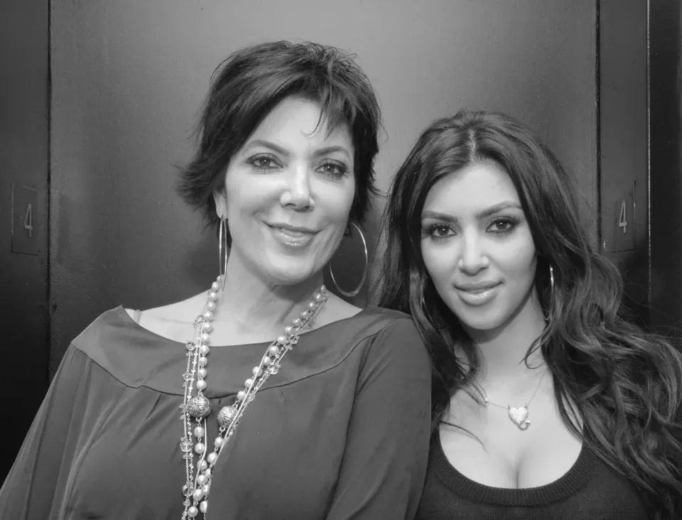 Black-and-white event portrait of two women
