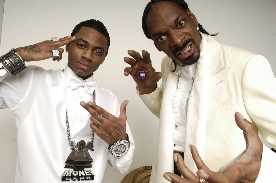 Editorial portrait of two hip-hop artists in white styling